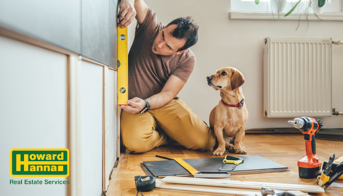 howard hanna a man works on repairing his home before selling it