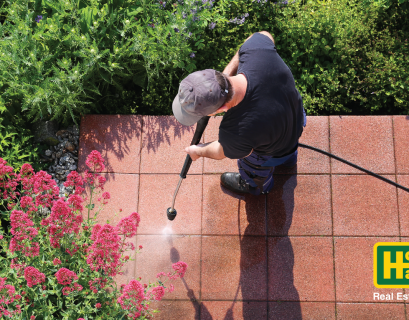 Howard Hanna person works on Spring Home Maintenance