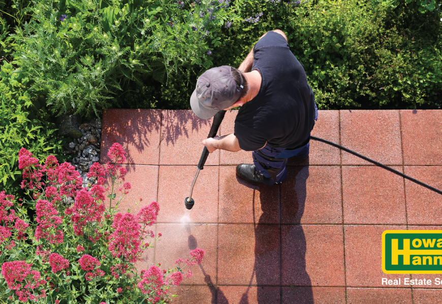 Howard Hanna person works on Spring Home Maintenance